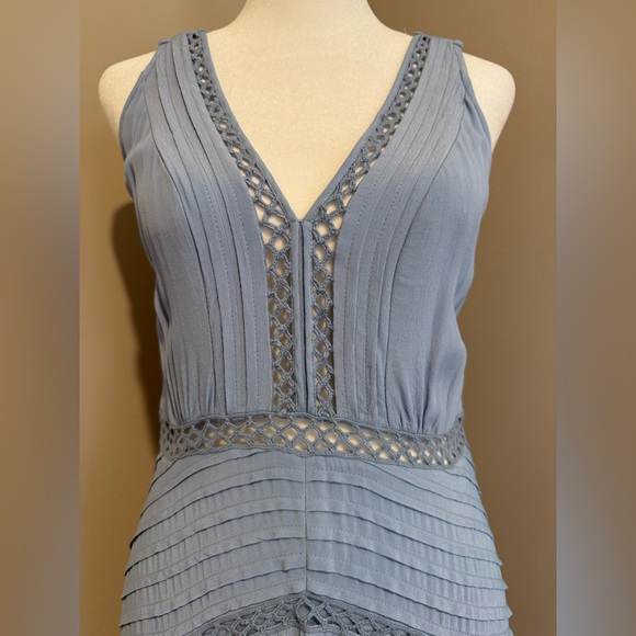 Reiss stunning blue dress size 4 never worn
Open back with tie - Picture 3 of 16